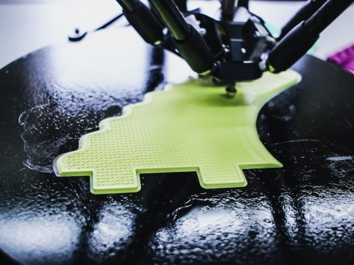 black printing machine printing on black and green pad